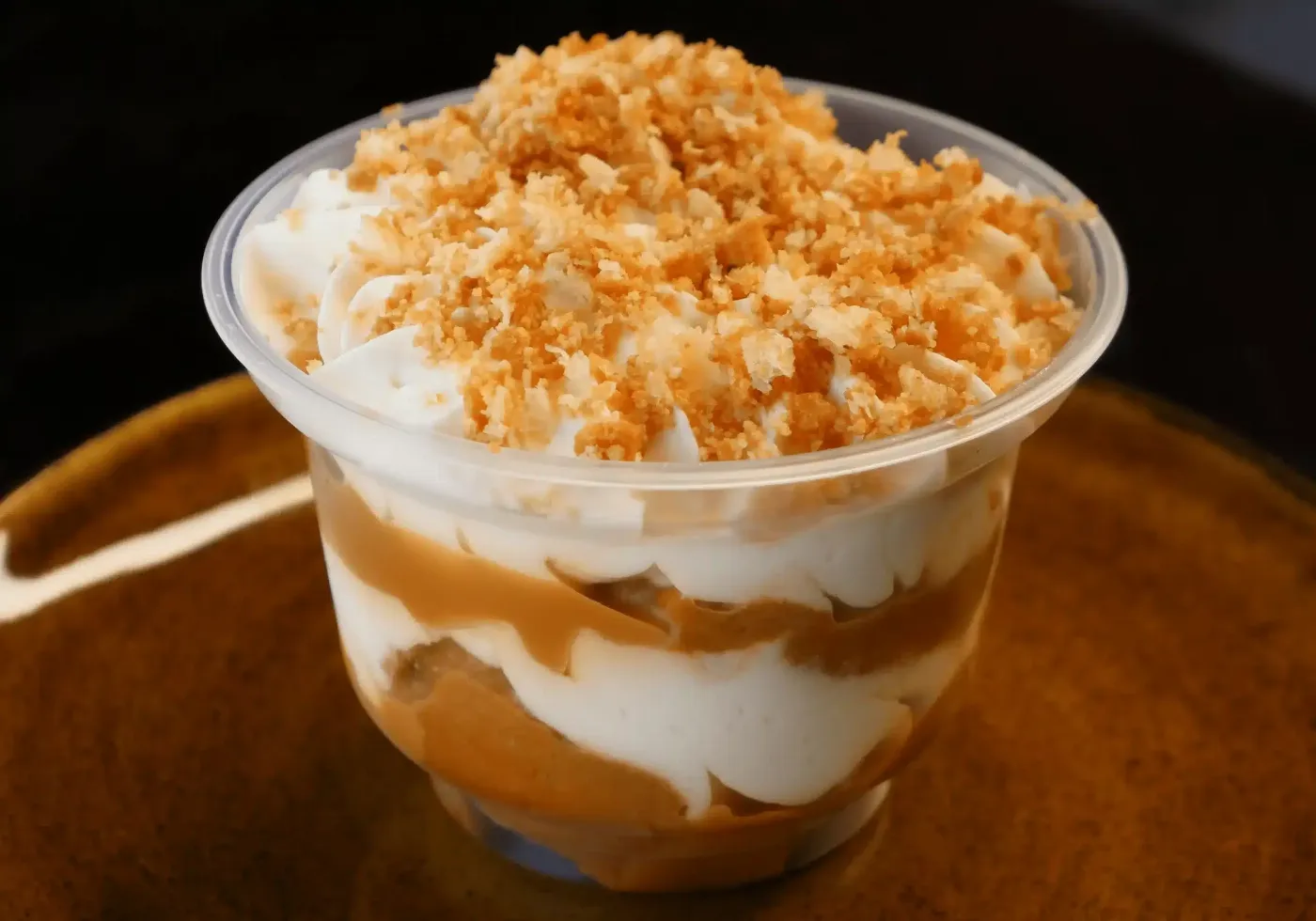 Clear plastic dessert cup illustrating a sheet-based packaging application